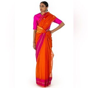 Raw Mango Orange Chanderi Silk Organza Saree with Rani border and gold edging.